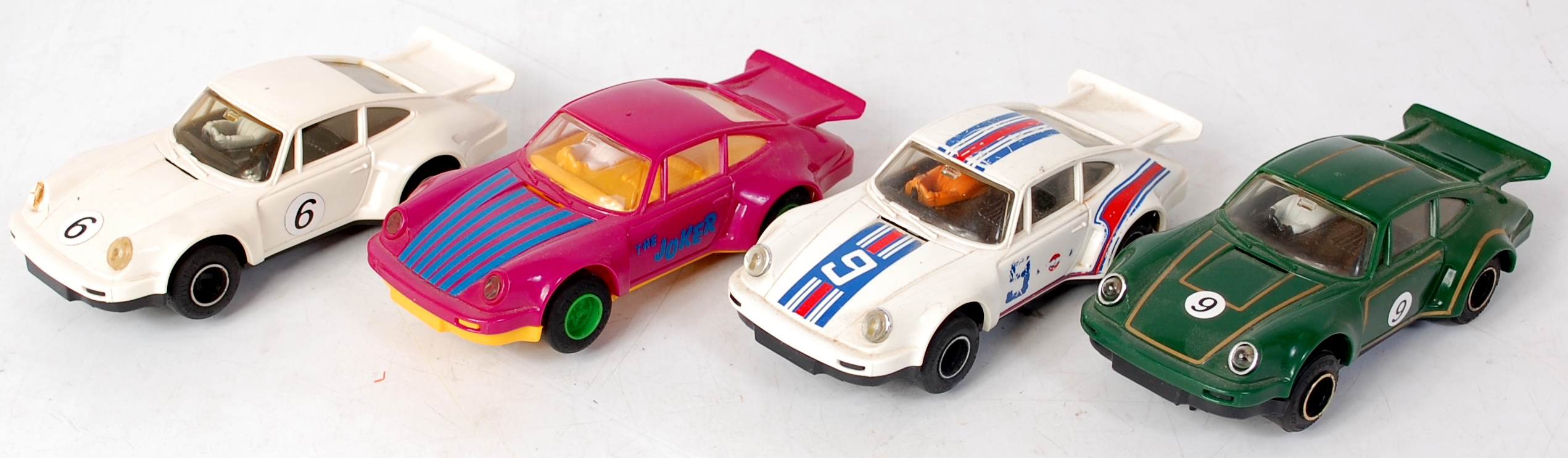 4 assorted loose Scalextric Porsche 911/