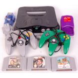 Nintendo 64 console with various accesso
