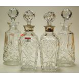A pair of modern moulded glass decanters
