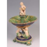A late 19th century Mintons Majolica table centrepiece, the whole surmounted with a pair of
