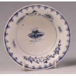 A Lowestoft porcelain pattypan, underglaze blue painted with a central moth within leaves and