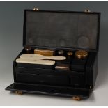 A circa 1900 French silver gilt and ivory travelling dressing table set, by Gustave Keller of Paris,
