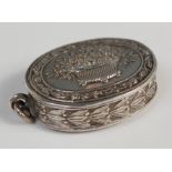 A circa 1900 continental silver snuff-box, of oval form, embossed to both obverse and reverse with a