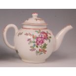 A Lowestoft porcelain teapot and cover, circa 1780, polychrome decorated in the famille rose palette