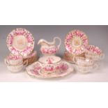 An early Victorian porcelain part teaset, decorated with Billingsley style pink cabbage roses amidst