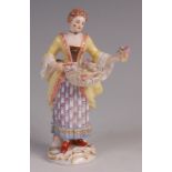 A Meissen porcelain figurine 'Flower seller', from the Cris de Paris series circa 1880, the whole