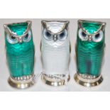 A set of three David Andersen of Norway sterling silver and enamel novelty table pepperettes in