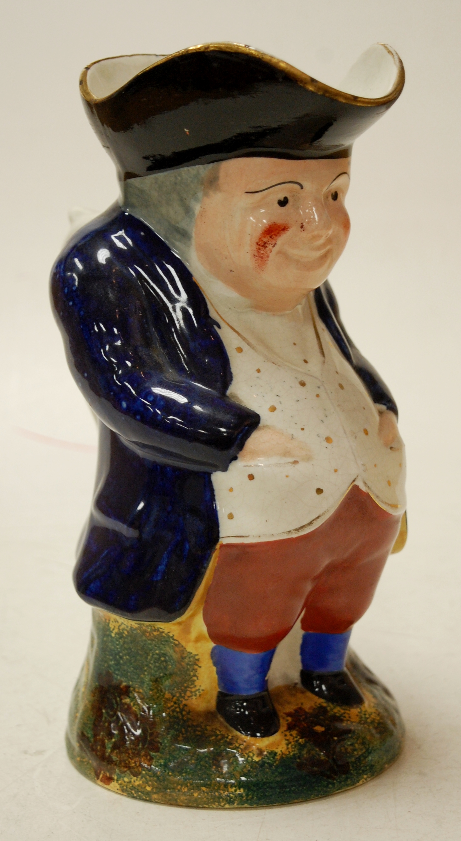 A late Victorian Staffordshire Toby jug,
