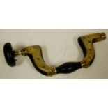 A Victorian ebony and brass mounted brac