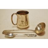 A silver small christening mug, late Georgian sauce ladle, and a continental white metal teaspoon (