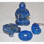 Four various Chinese lapis lazuli carvings to include a disc ring Condition Report / Extra