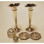 A pair of silver specimen vases on loade