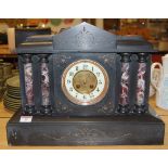 A circa 1900 slate mantel clock of archi