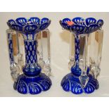 A pair of Bohemian overlaid blue glass p