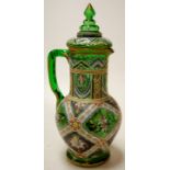 An early 20th century bohemian style green glass overlaid jug and cover Condition Report / Extra