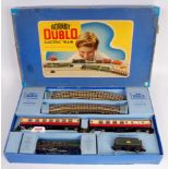 A Hornby Dublo EDP12 'Duchess of Montrose' train set, containing a gloss green loco and tender, 2