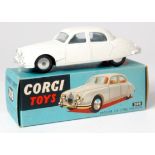 Corgi Toys, 208 Jaguar 2.4 litre, white body with silver detailing, flat spun hubs with glazing, in