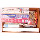 10 assorted aircraft and military vehicle plastic kits, 9 as issued and 1 partly made,