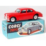 Corgi Toys, 205 Riley Pathfinder Saloon, red body with silver detailing and flat spun hubs, in the