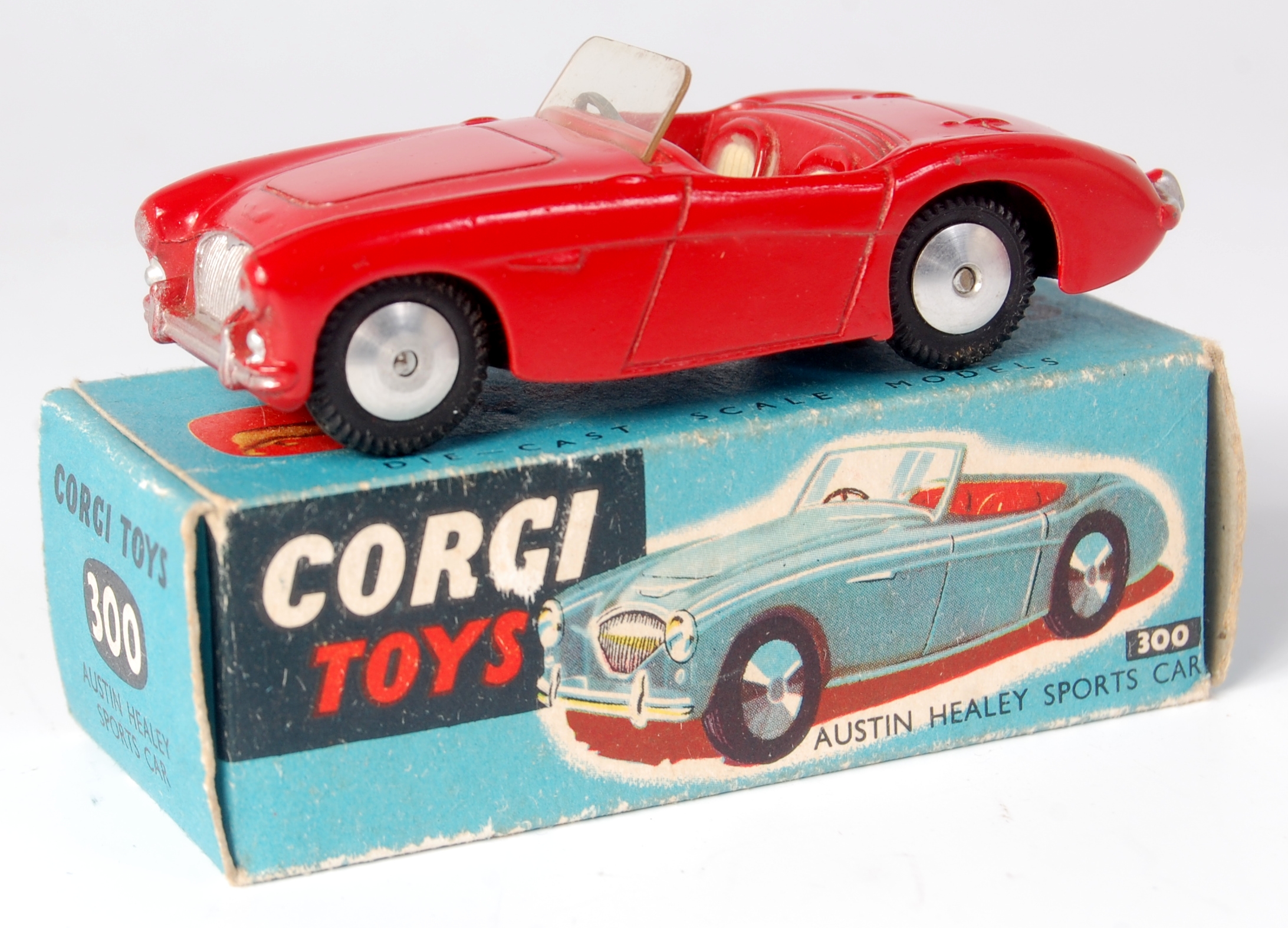 Corgi Toys, 300 Austin Healey sports car, red body with cream seats, flat spun hubs, in the