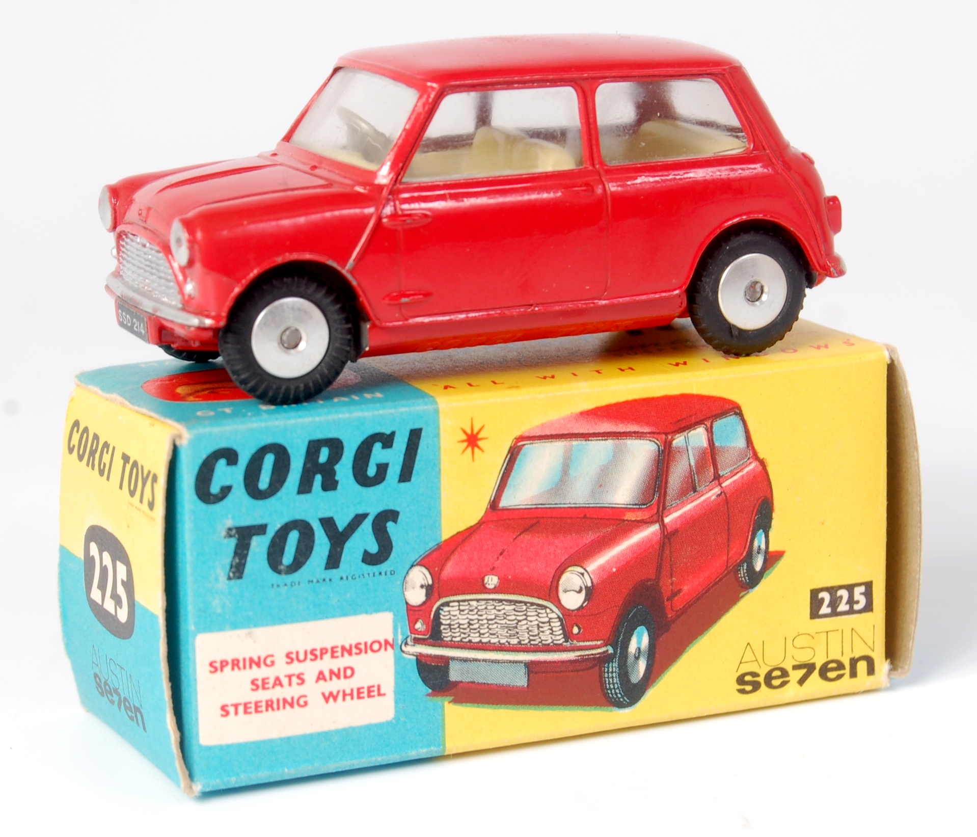 Corgi Toys, 225 Austin 7 Mini Saloon, red body with yellow interior, spun hubs, with silver