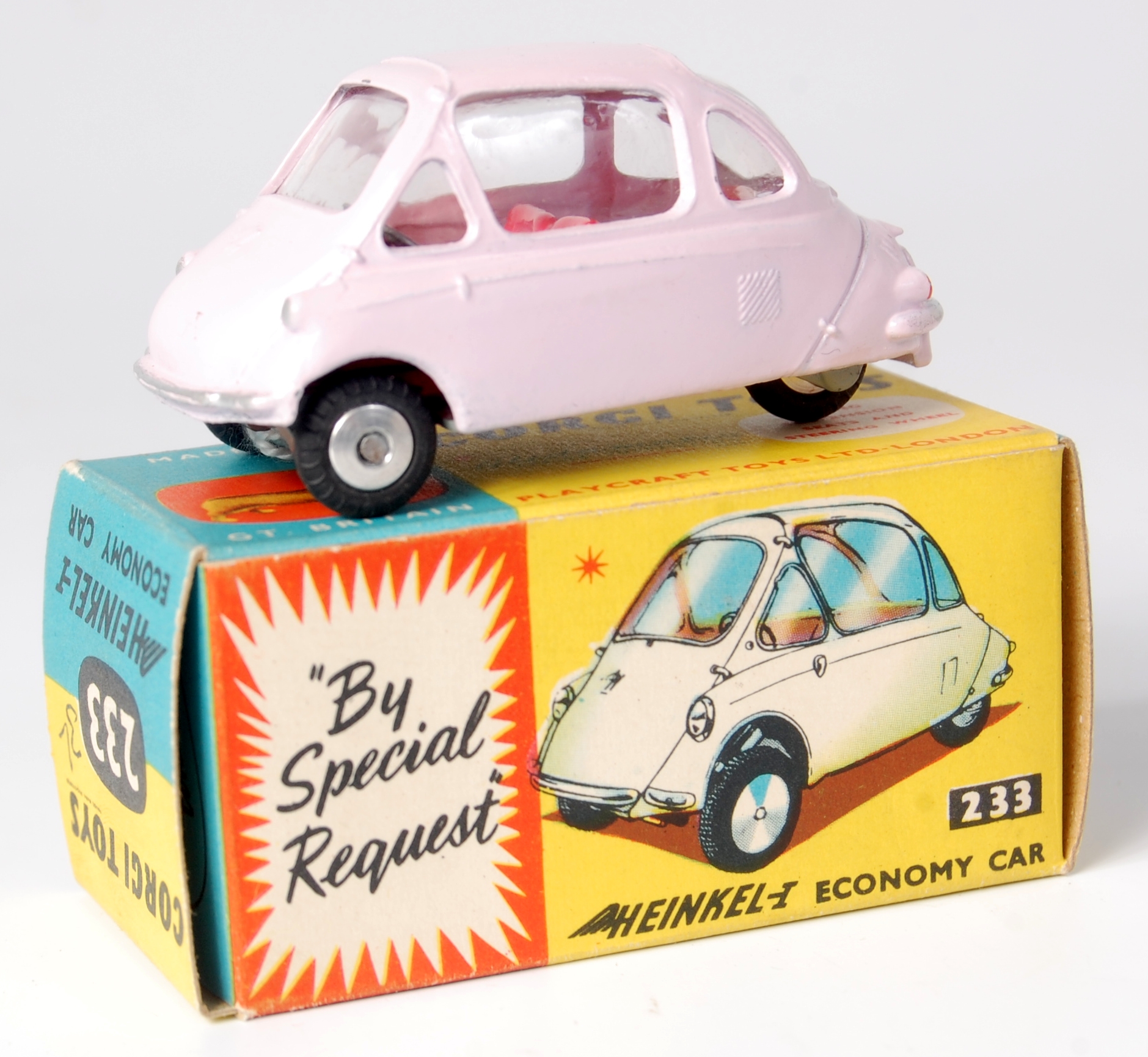 Corgi Toys, 233 Heinkel Trojan economy car, pink body with red interior, flat spun hubs, in the