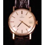 A 1960s Omega gents 9ct gold cased wristwatch, having a signed silvered dial with baton markers,