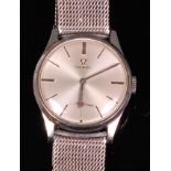 An Omega steel cased gents wristwatch, having a signed silvered dial with baton markers,