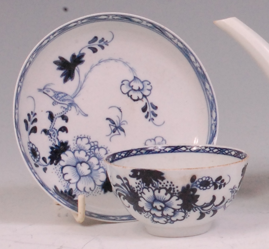 An 18th century Liverpool porcelain tea bowl and saucer,