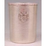 A Russian silver vodka beaker, bearing coat of arms and having engine turned decoration, 3.