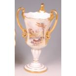 A Royal Crown Derby porcelain pedestal three handled vase/tyg, painted in enamels by W E J Dean with