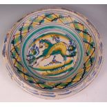 An 18th century heavily potted continental (probably Spanish) maiolica bowl, of good size,