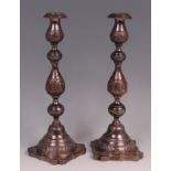 A pair of mid-Victorian silver table candlesticks,