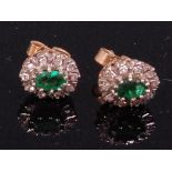 A pair of 9ct gold emerald and diamond set ear studs,