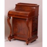 A Victorian figured walnut piano-top davenport,
