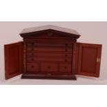 A late Victorian mahogany collectors cabinet, of architectural outline,