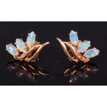 A pair of contemporary 14ct gold opal set ear studs,