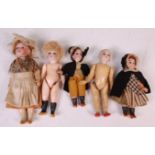 A French miniature bisque headed and composition doll, with painted features, marked Paris verso,