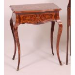 A 19th century rosewood and kingwood parquetry inlaid needlework table, in the French taste,
