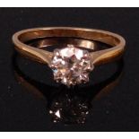 A ladies 18ct gold diamond solitaire ring, the claw set brilliant weighing approx. 0.85ct, size M