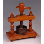 A late 19th century French fruitwood duck-press,