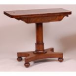 An early Victorian rosewood pedestal card table, having a D-shaped fold-over top with swivel action,