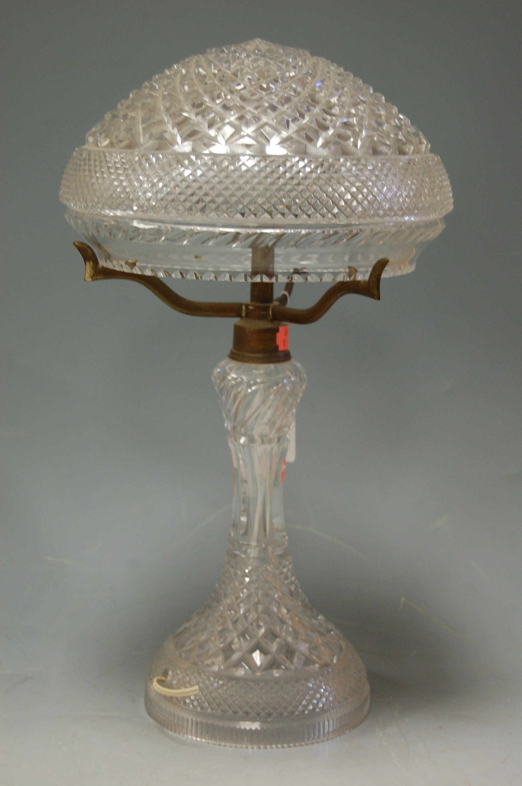 A cut crystal table lamp and shade,