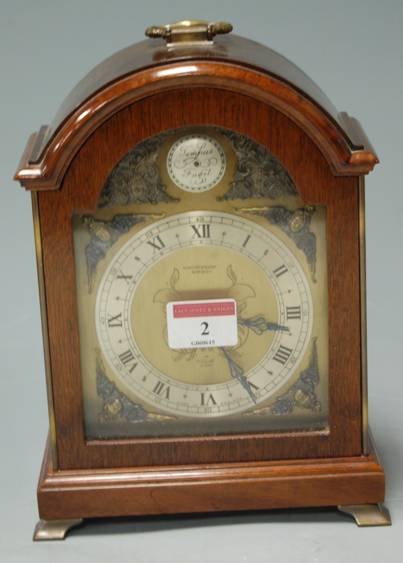 An Elliott walnut cased mantel clock,