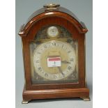 An Elliott walnut cased mantel clock,
