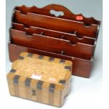 A reproduction mahogany stationery rack,