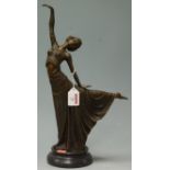 An Art Deco style bronze figurine of a dancing girl