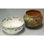 A Doulton Lambeth stoneware jardiniere of small size decorated with autumn leaves and a Doulton