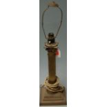 A circa 1900 lacquered brass Corinthian column lamp base (later fitted for electricity)