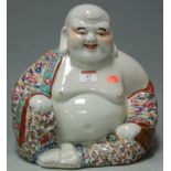 A 20th century Chinese glazed and enamel decorated stoneware Buddha Condition Report / Extra